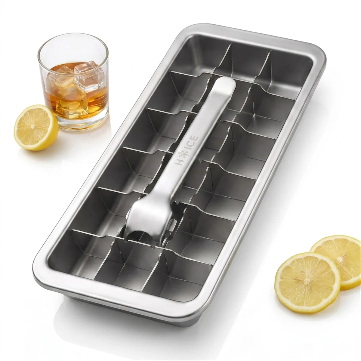 HYICE 18-Cube Stainless Steel Ice Cube Tray with a whiskey glass and lemon